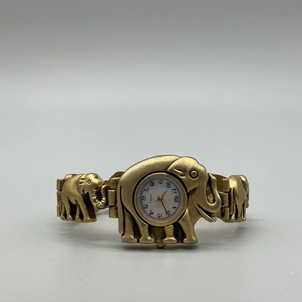 Womens Watch 31mm White Dial Gold Tone Elephant Bracelet New Battery 6.5